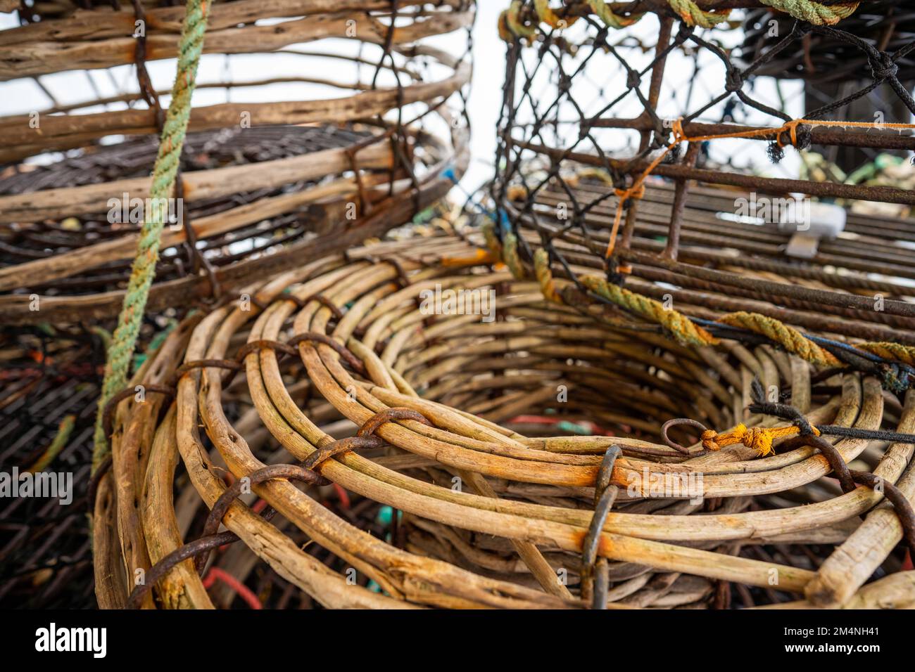 crayfish traps on a fishing boat. lobster wooden pots on the back of a  fishing ship in australia in fishing season Stock Photo - Alamy