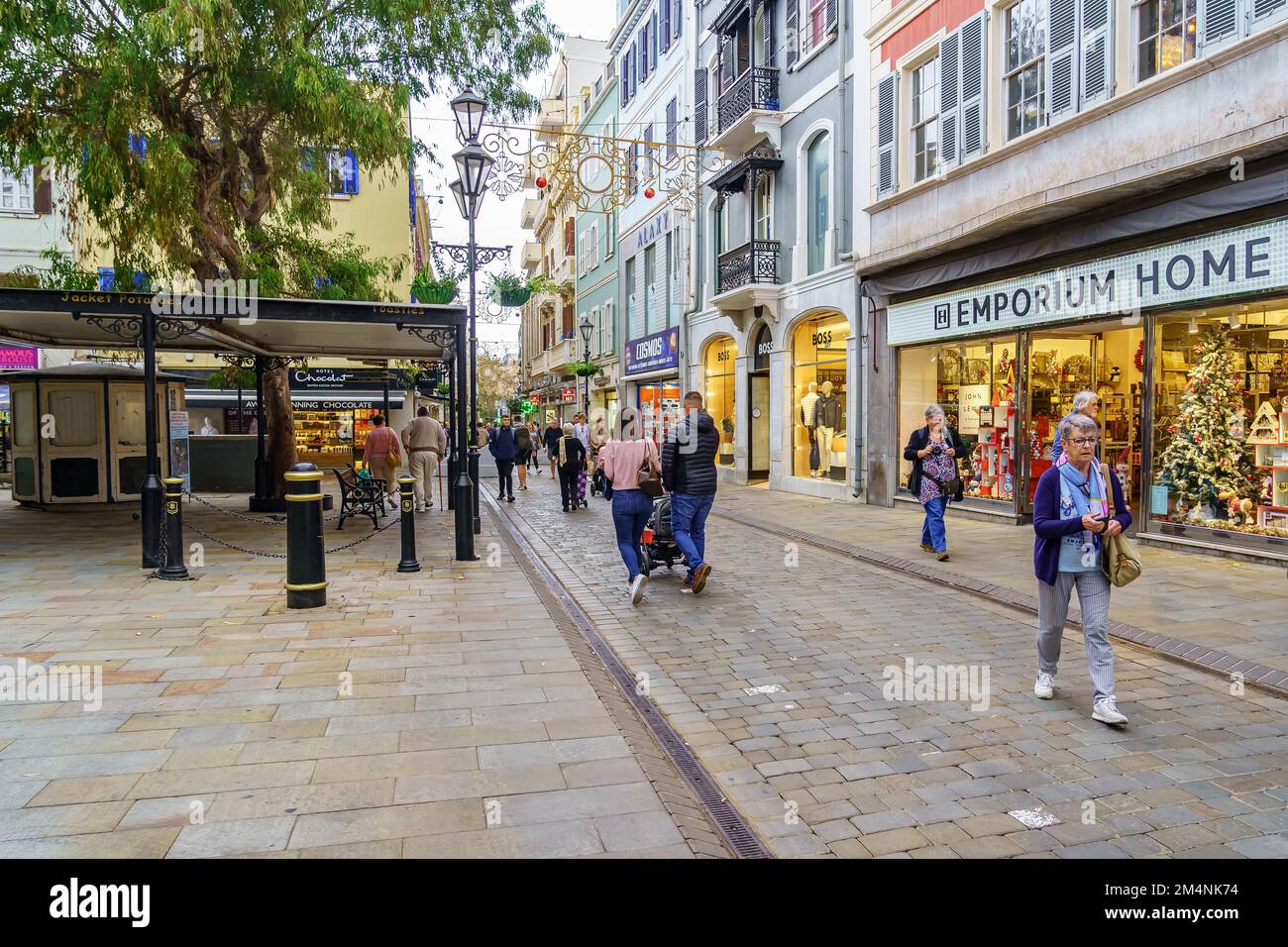 Main Street, Gibraltar, UK, November 11, 2022 Street shops and people