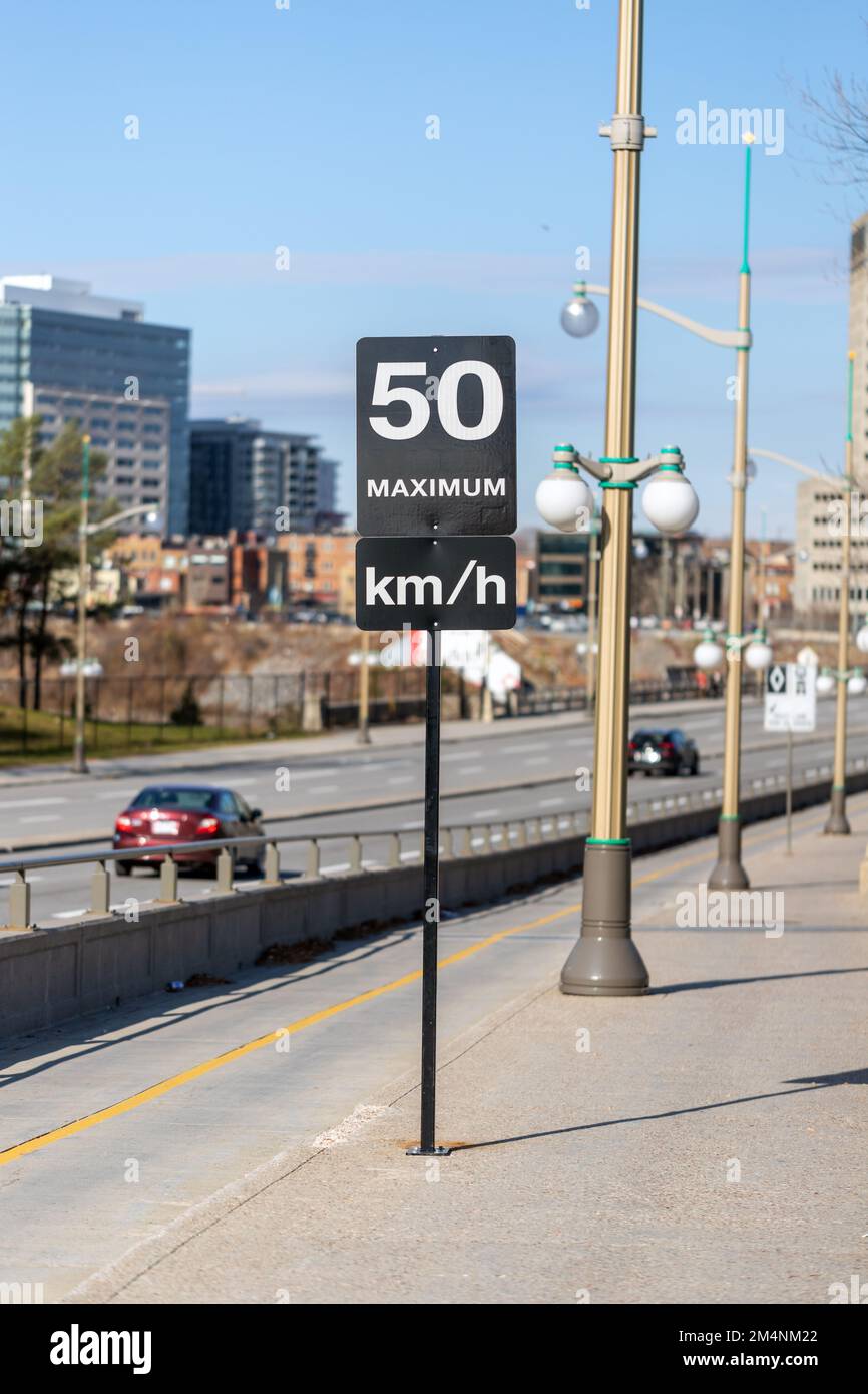 Speed limit road sign in the street, 50 km per hour maximum in Ottawa