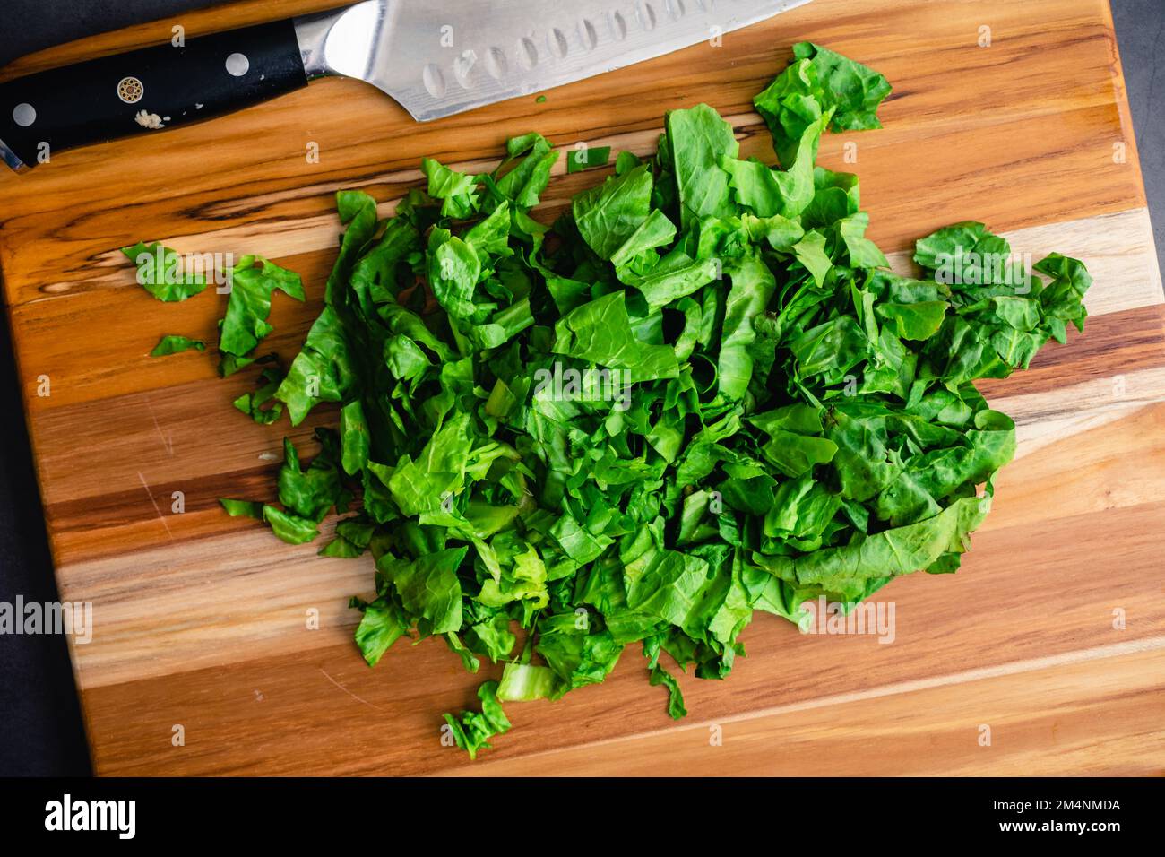 Roughly Chopped Escarole Leaves on a Wood Cutting Board Chopped leafy
