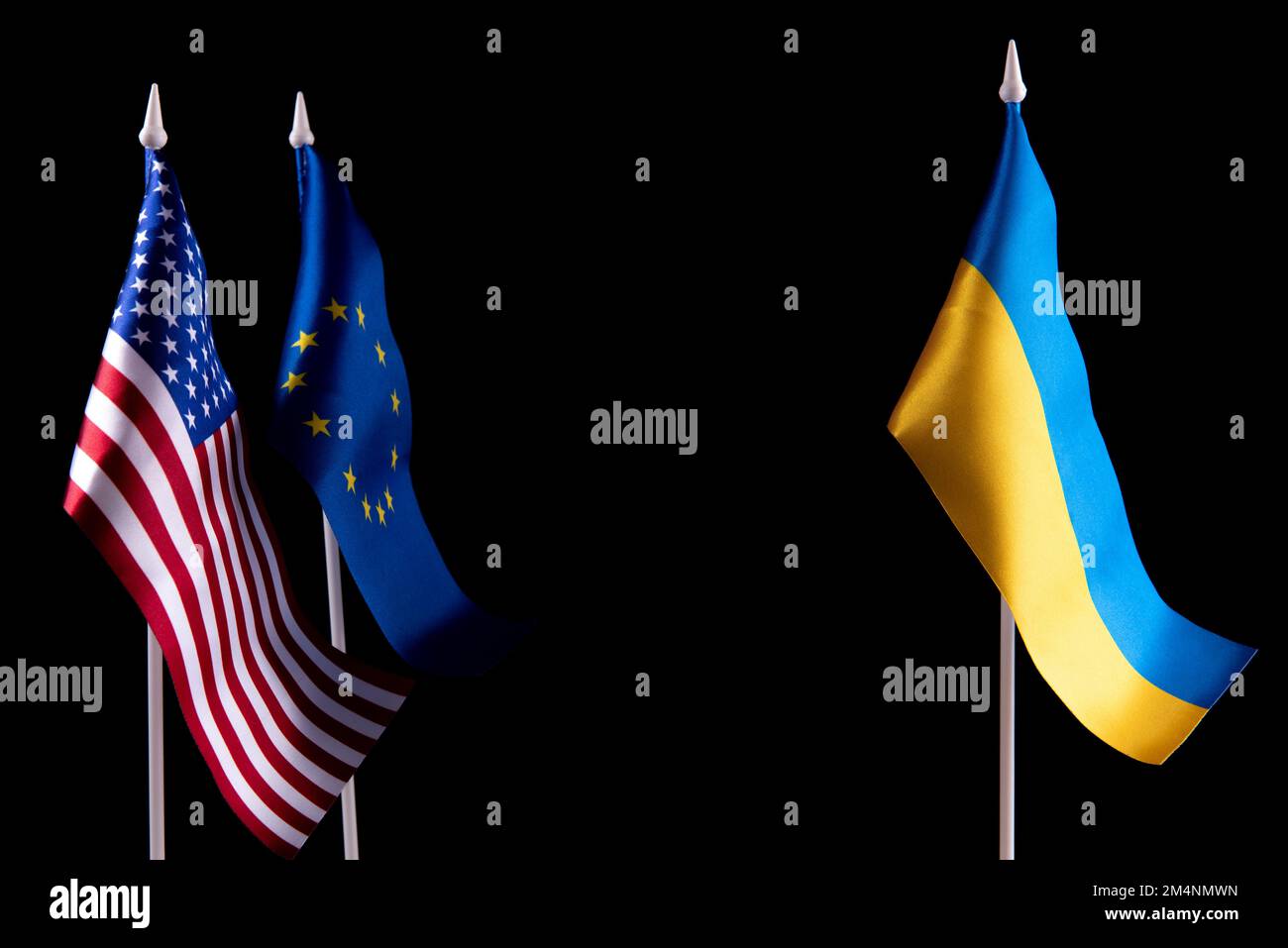 The flag of Ukraine of the United States and Europe on a black background. The concept of support for Ukraine in difficult times. Relations between Stock Photo