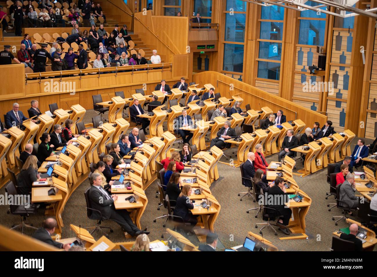 Edinburgh, Scotland, UK. 22nd Dec, 2022. PICTURED: Reactions inside the debating chamber after Stage 3 bill passes on the Gender Recognition Reform (Scotland) Bill, where people who are looking to get a Gender Recognition Certificate (GRC) using self ID, do not need to get any medical reports in order to get their GRC. Credit: Colin D Fisher Credit: Colin Fisher/Alamy Live News Stock Photo