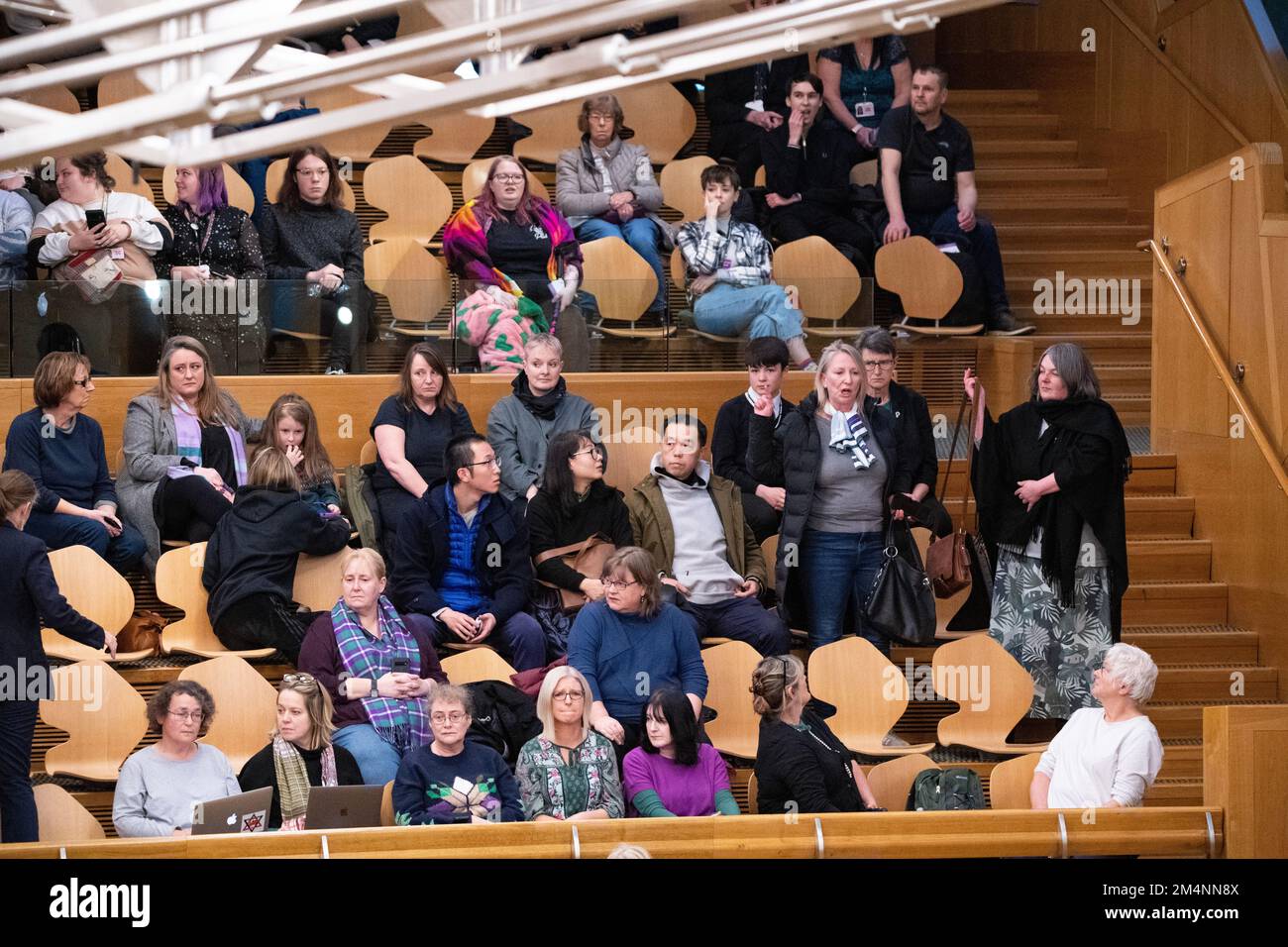 Edinburgh, Scotland, UK. 22nd Dec, 2022. PICTURED: Reactions inside the debating chamber after Stage 3 bill passes on the Gender Recognition Reform (Scotland) Bill, where people who are looking to get a Gender Recognition Certificate (GRC) using self ID, do not need to get any medical reports in order to get their GRC. Credit: Colin D Fisher Credit: Colin Fisher/Alamy Live News Stock Photo