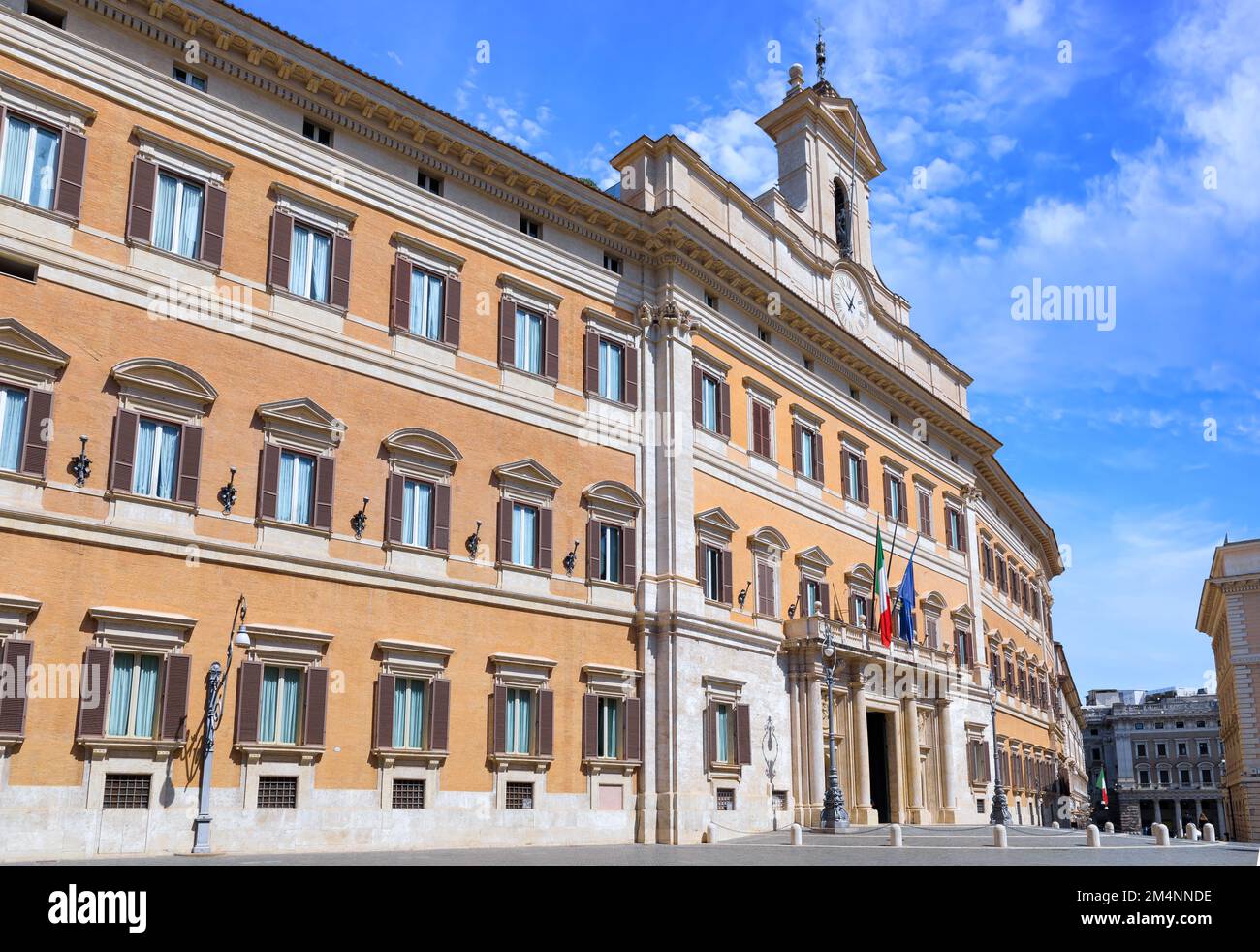 Facade of Montecitorio Palace (Palazzo Montecitorio) in Rome: it's the seat of the Chamber of Deputies, one of Italy’s two houses of parliament. Stock Photo