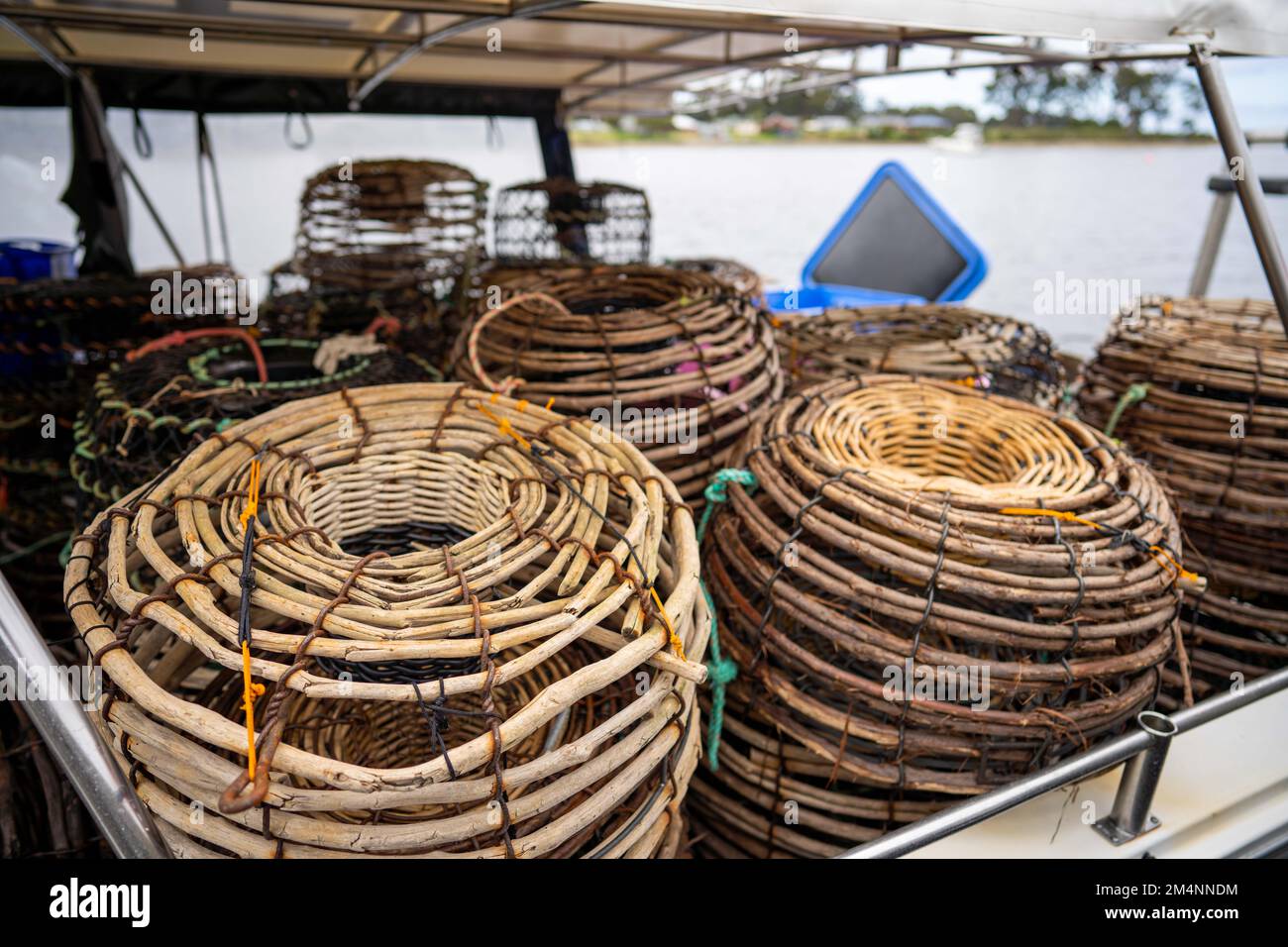 crayfish cray pots on the back of a fishing boat in tasmania australia