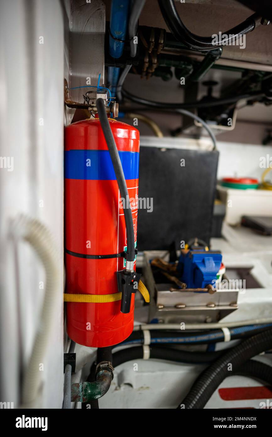 fire extinguisher in the engine room of a boat in australia Stock Photo