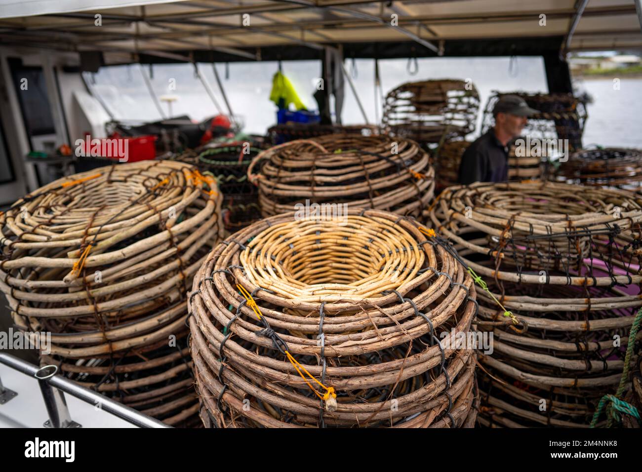 crayfish cray pots on the back of a fishing boat in tasmania australia