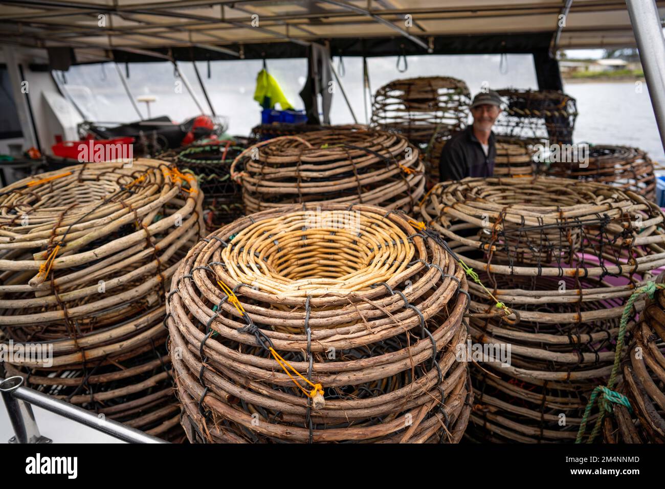 crayfish cray pots on the back of a fishing boat in tasmania australia