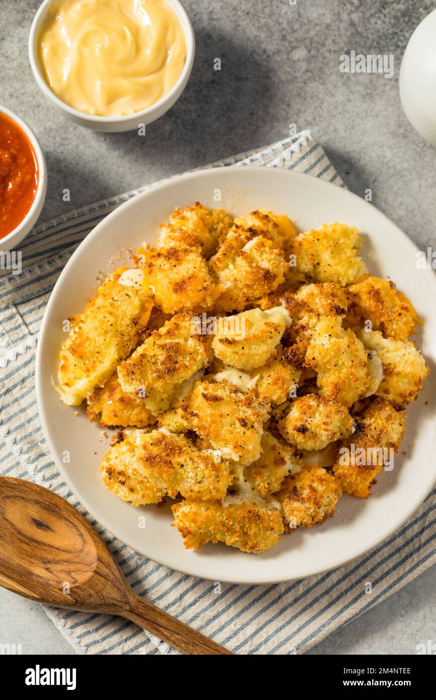 Homemade Baked Wisconsin Cheese Curds with Mayo and Marinara Stock