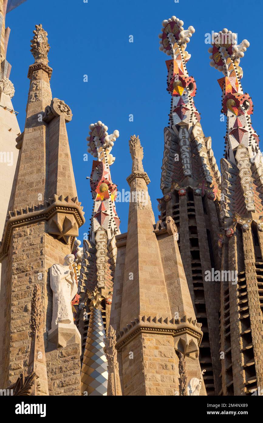 Statue high up on the Sagrada Família, Barcelona, Spain Stock Photo