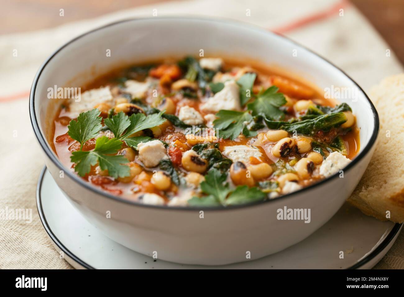 Bowl with Greek Black-eyed Peas Stew with Spinach Stock Photo - Alamy