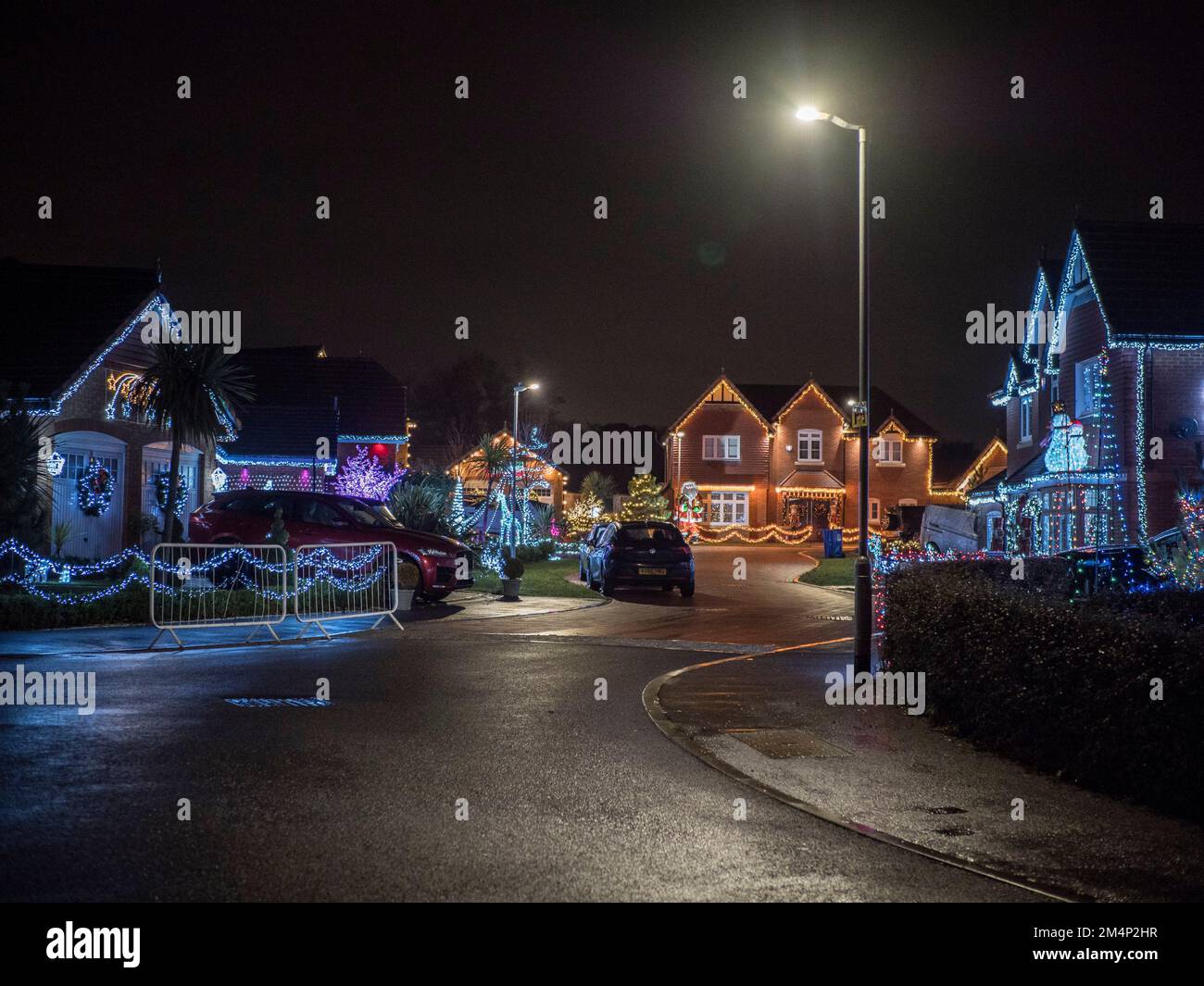 Eastchurch, Kent, UK. 22nd Dec, 2022. Kingsborough Manor estate in Eastchurch, Kent on the Isle of Sheppey goes 'all out' for Christmas with most of the properties in the area being decorated with amazing Christmas lights displays. Credit: James Bell/Alamy Live News Stock Photo