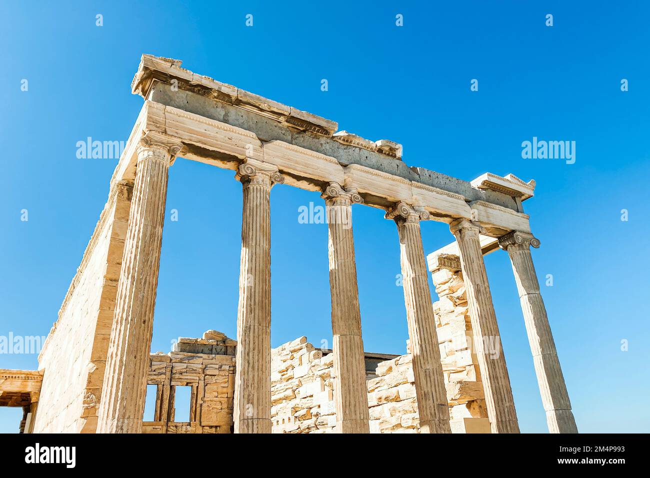 Athens, Greece - September 16, 2022: Detailed view of the сolonnade of The Acropolis of Athens Stock Photo