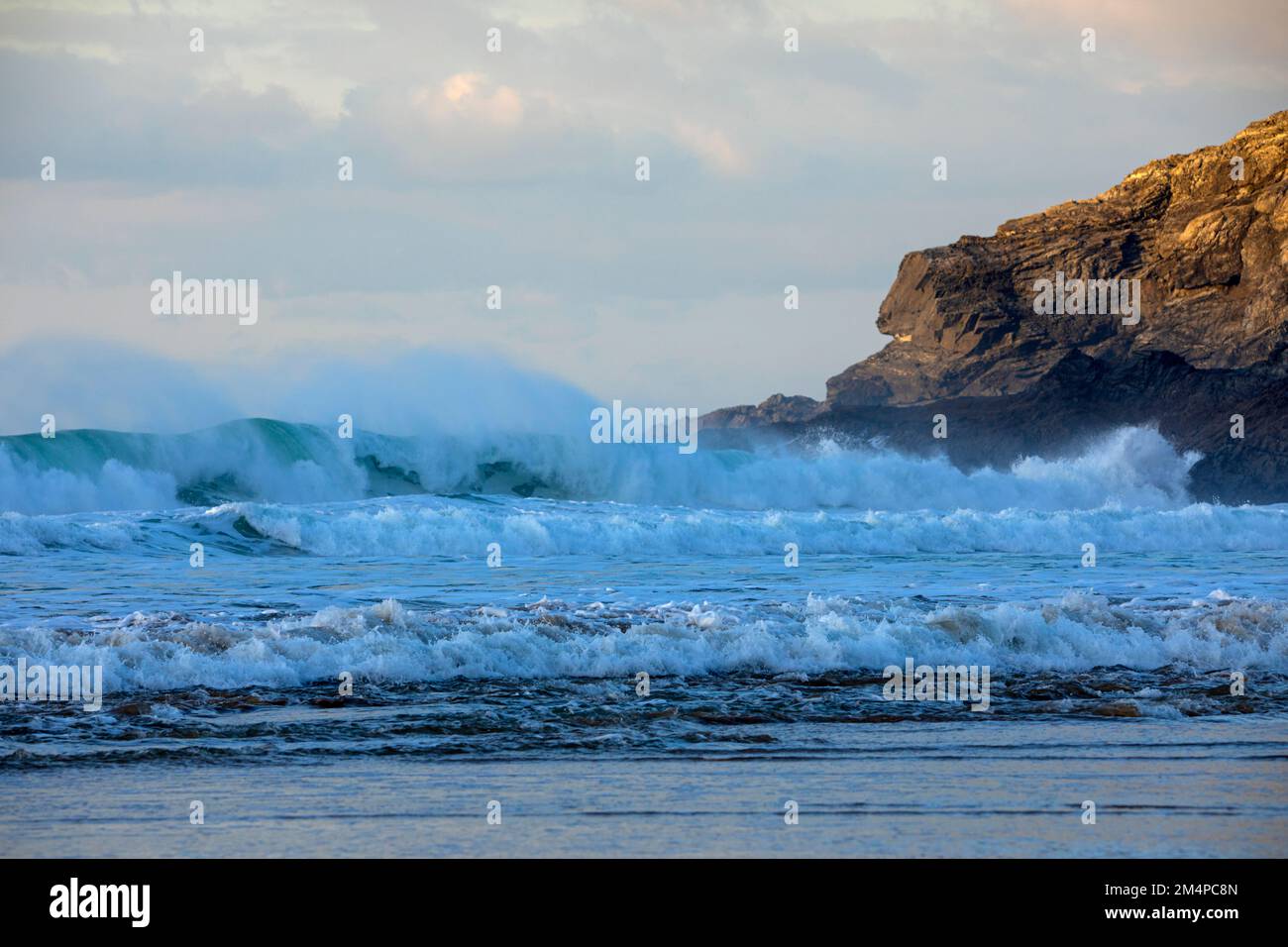 Crashing waves off Holywell Bay Cornwall Stock Photo