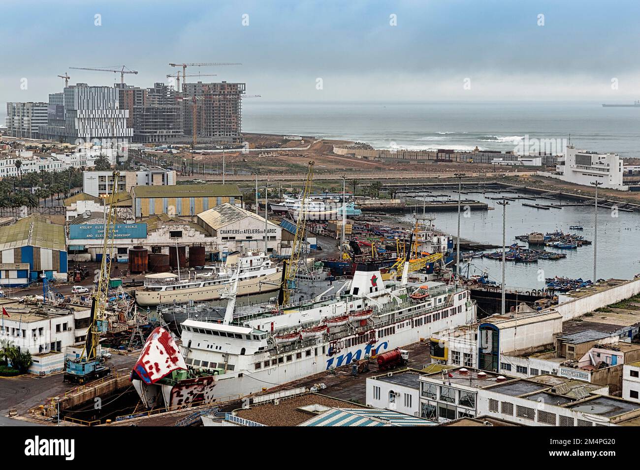 View from above of the harbour, shipyard and high-rise buildings, dreary weather, Casablanca, Morocco Stock Photo