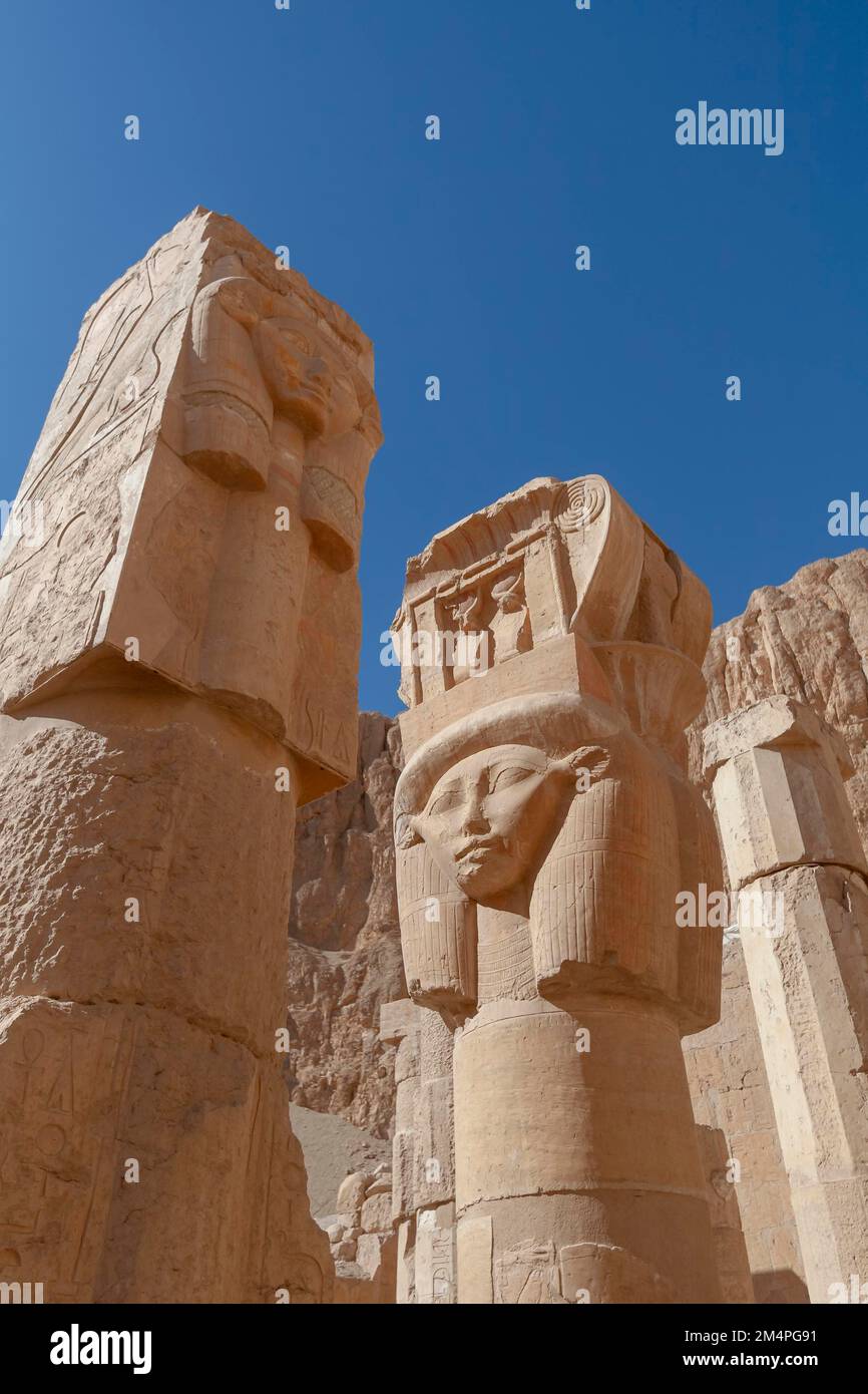 Deir el-Bahari, funerary temple of Hatshepsut, column with head, Luxor Egypt Stock Photo