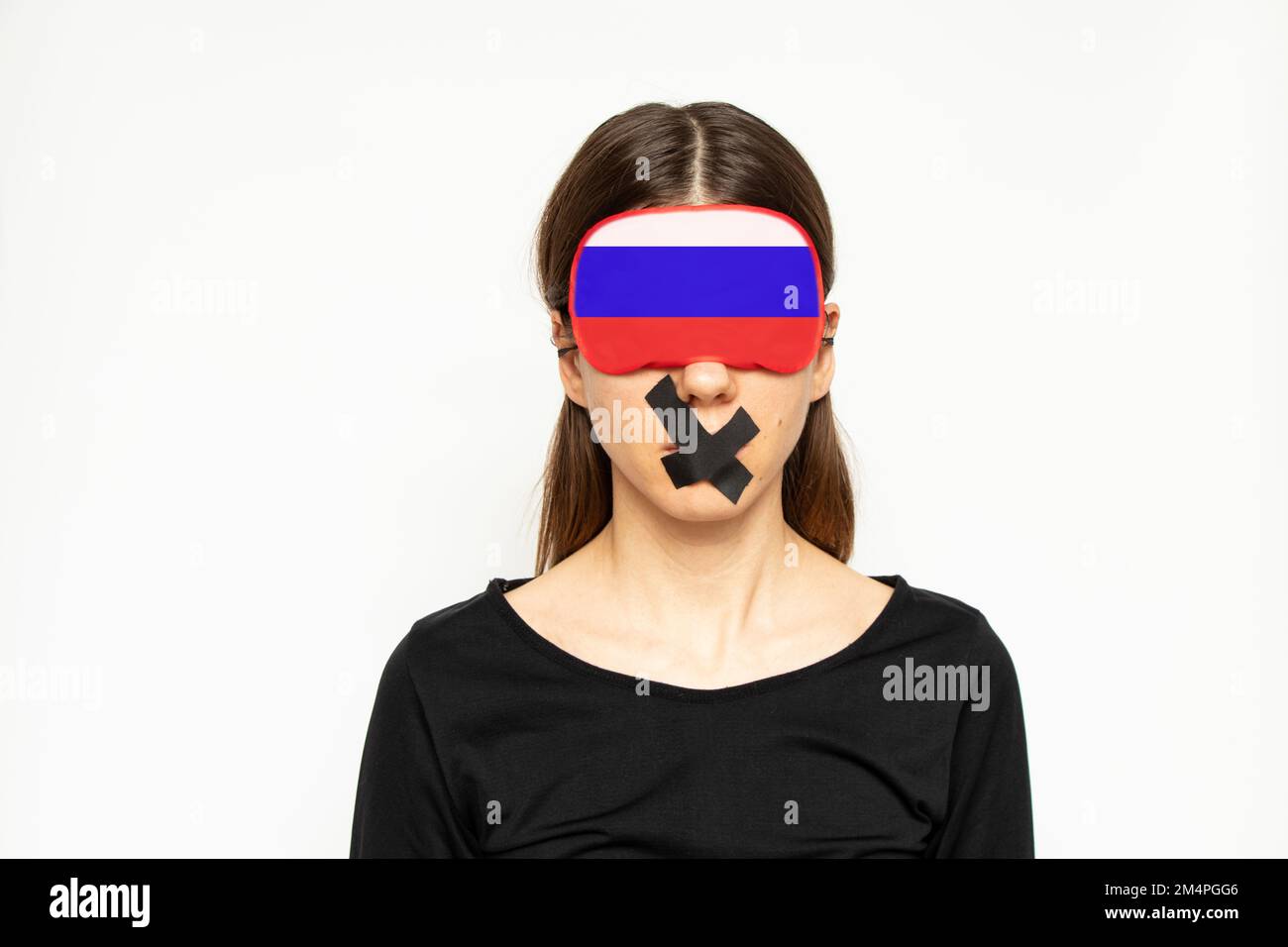 Serious Woman Adjusts Blindfold Over Her Eyes Stock Photo, Picture and  Royalty Free Image. Image 70769576.