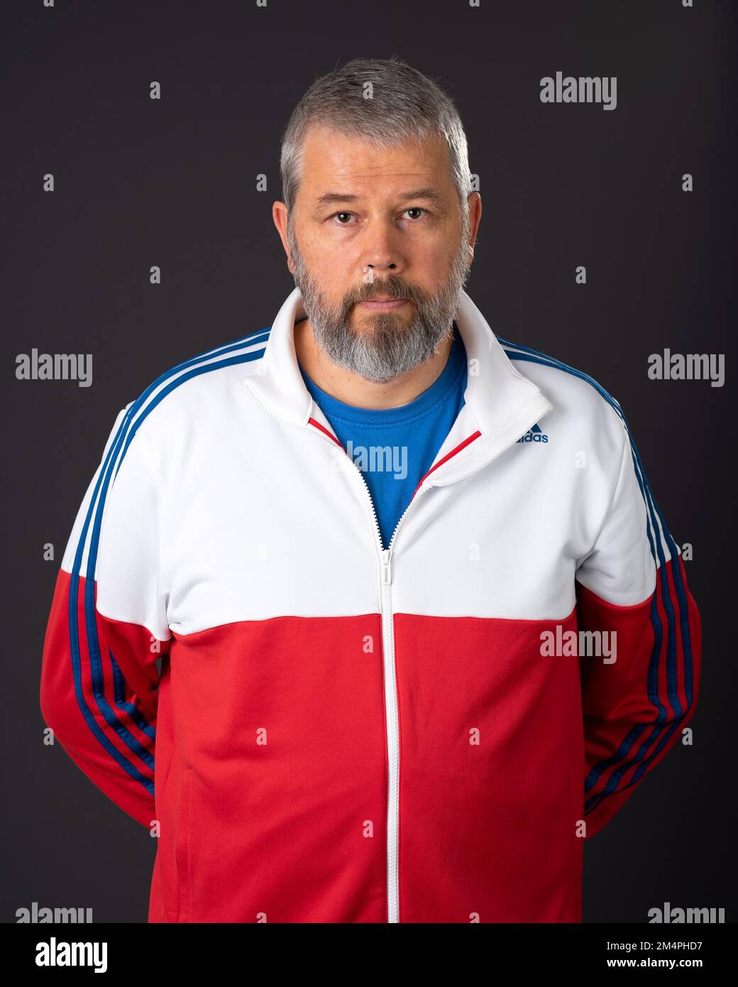 Man with full beard, 55 years old in tracksuit Stock Photo - Alamy