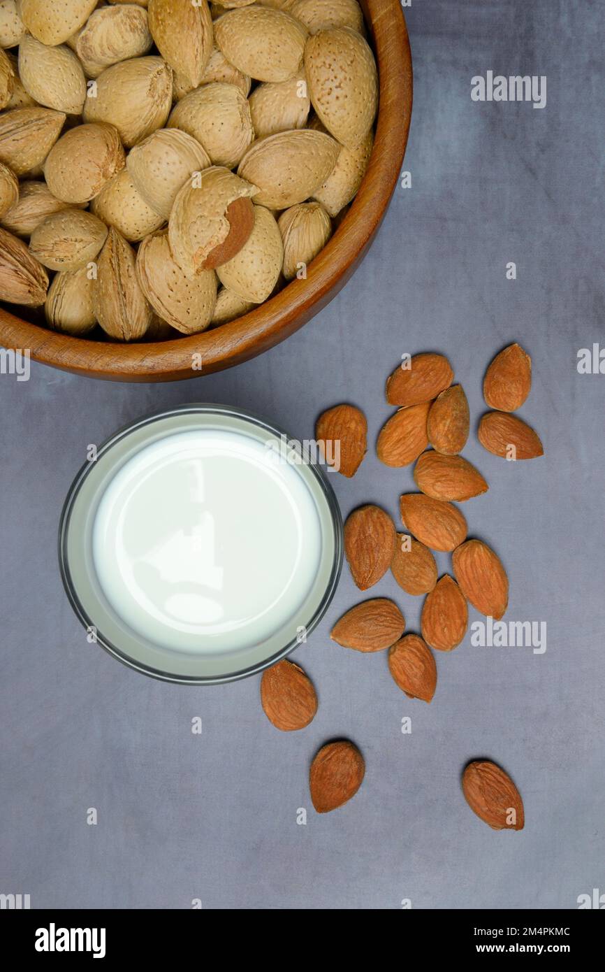 Almond, almonds and almond kernels in shell and glass Milk, almond tree