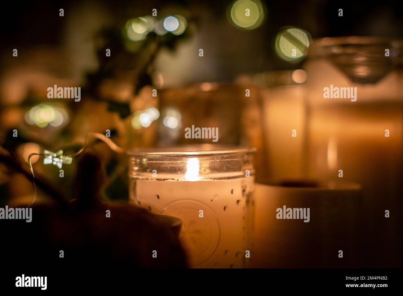 Pretty candles on a mantelpiece, with a shallow depth of field Stock