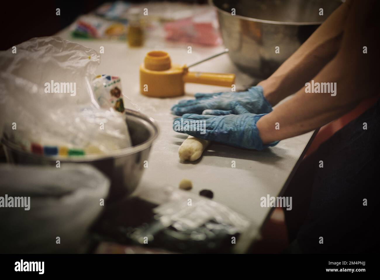 Mooncake Chef A professional chef making little mooncakes for the Mid-Autumn Festival ...