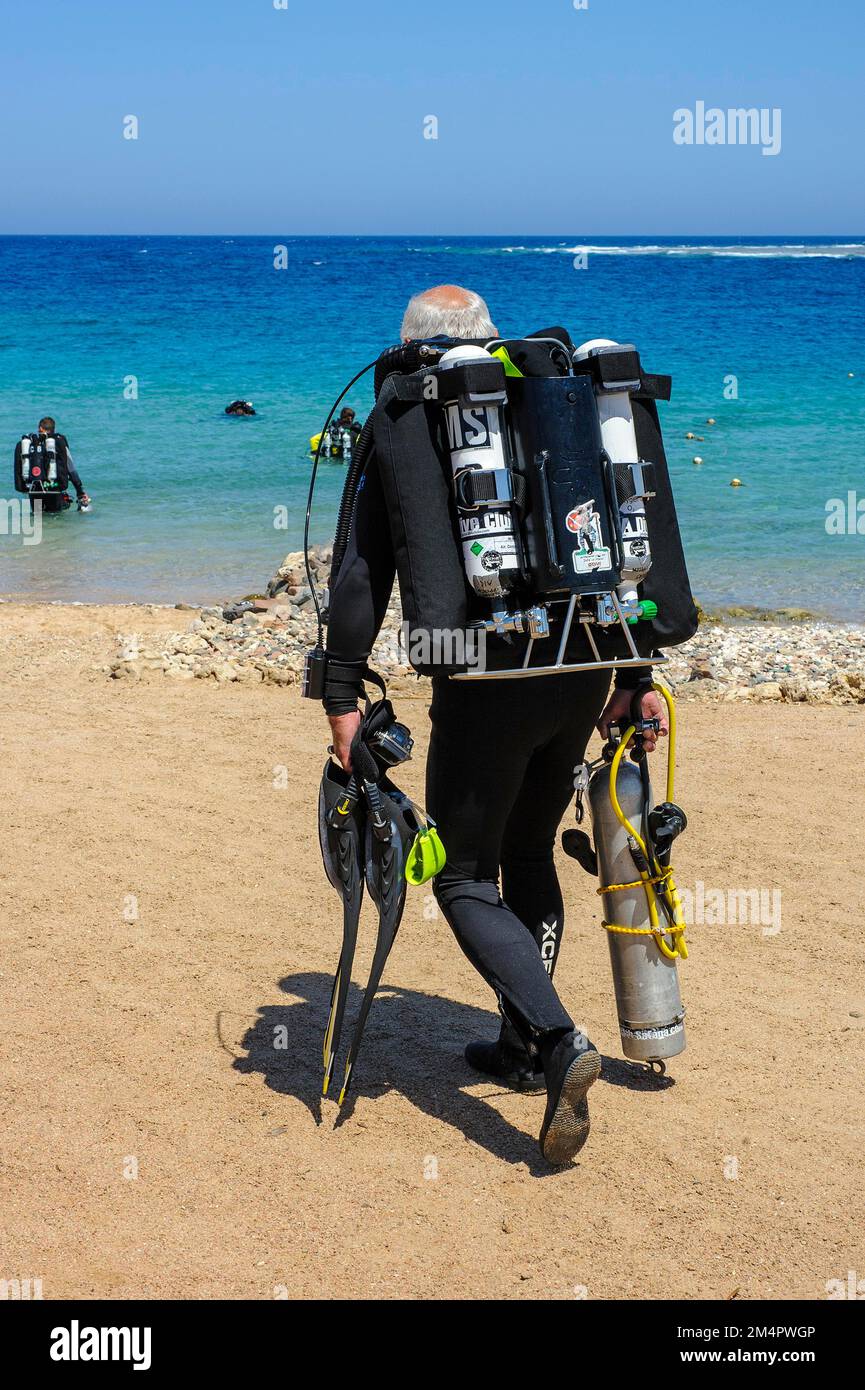 Diver with scuba equipment for technical diving tech diving rebreather