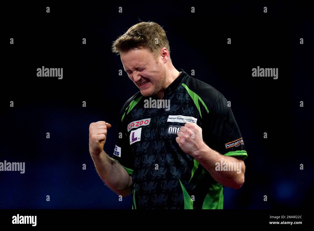 Jim Williams celebrates defeating James Wade during day eight of the Cazoo World Darts Championship at Alexandra Palace, London. Picture date: Thursday December 22, 2022. Stock Photo