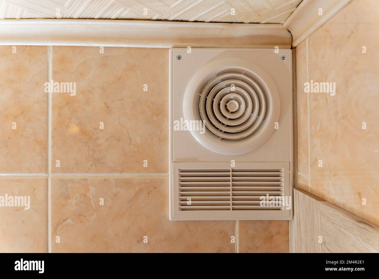 ventilation grate and exhaust fan in the toilet. Air exchange Stock