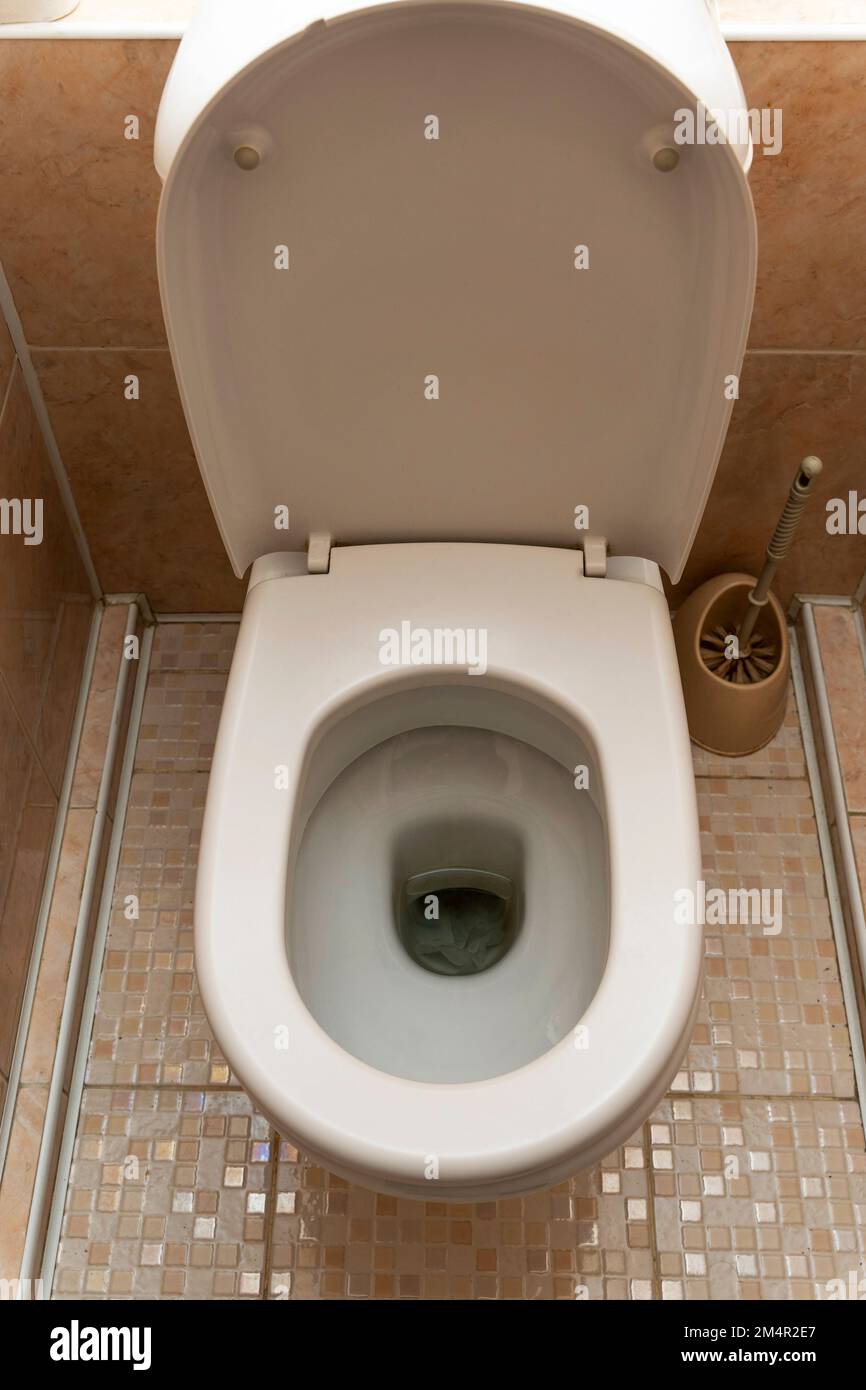 flushing the toilet. Toilet, Flushing Water. close up Stock Photo Alamy