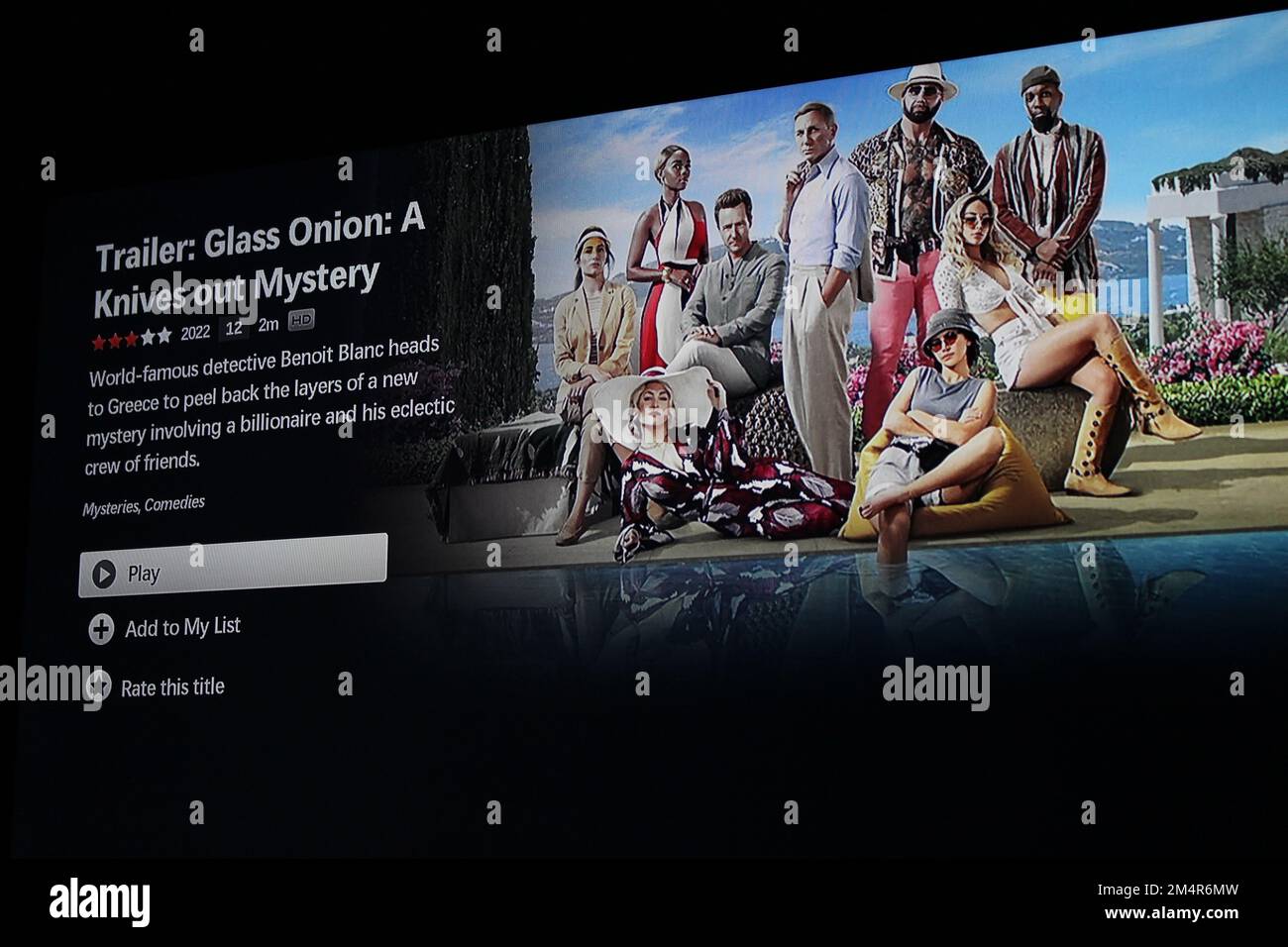 TV screen showing the Netflix page for the Glass Onion trailer, before the movie was available to stream at home on the platform Stock Photo