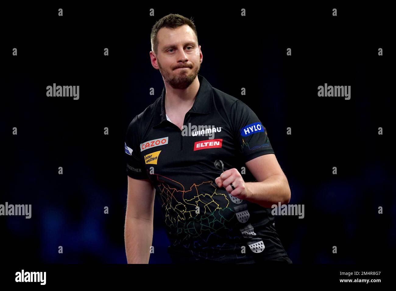 Florian Hempel celebrates during his match against Luke Humphries