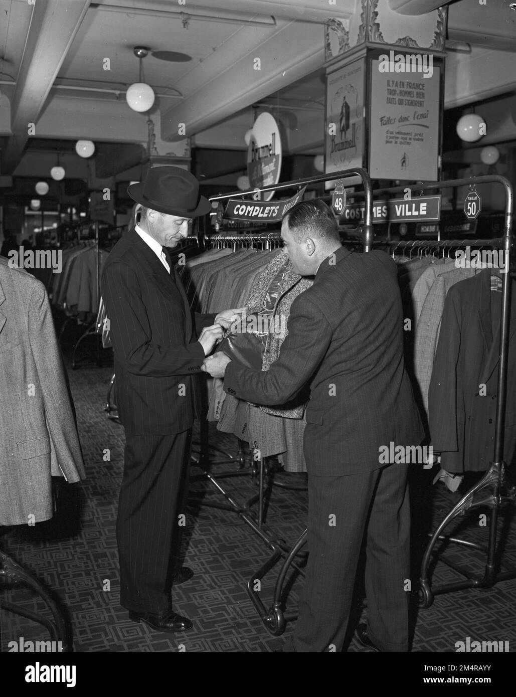 Example Mascal Plan Men's and Women's Wear. Photographs of Marshall Plan Programs, Exhibits ...