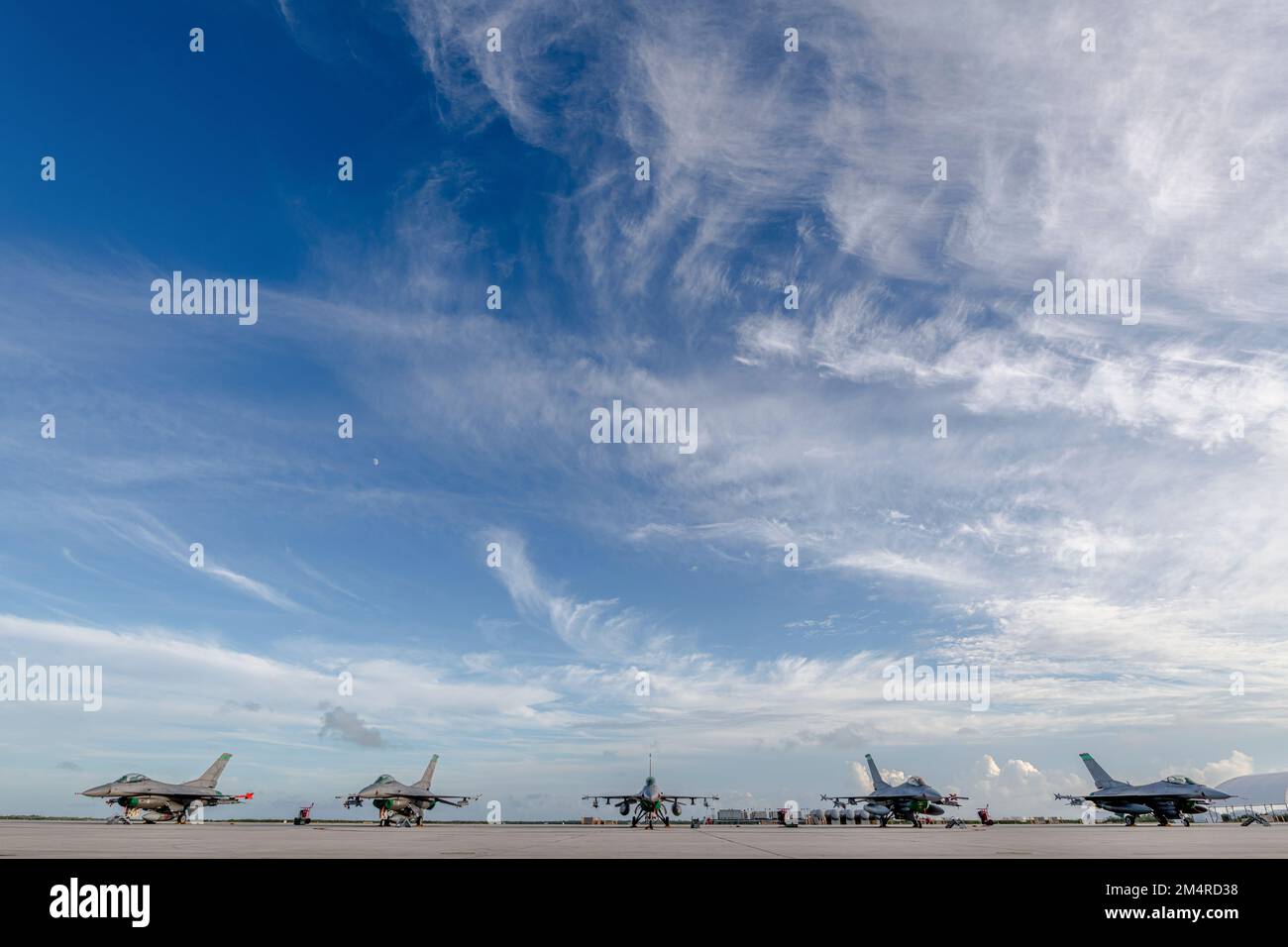 U.S. Air Force F-16 Fighting Falcons, assigned to the Ohio National Guard’s 180th Fighter Wing, sit on the flightline at Naval Air Station Key West, Fla., Nov. 2, 2022. The 180FW deployed to NAS Key West to train with VFC-111, the Navy's premier adversary squadron, providing realistic training scenarios that ensure the 180FW is prepared for homeland defense and contingency operations around the globe.  (U.S. Air National Guard photo by Staff Sgt. Kregg York) Stock Photo