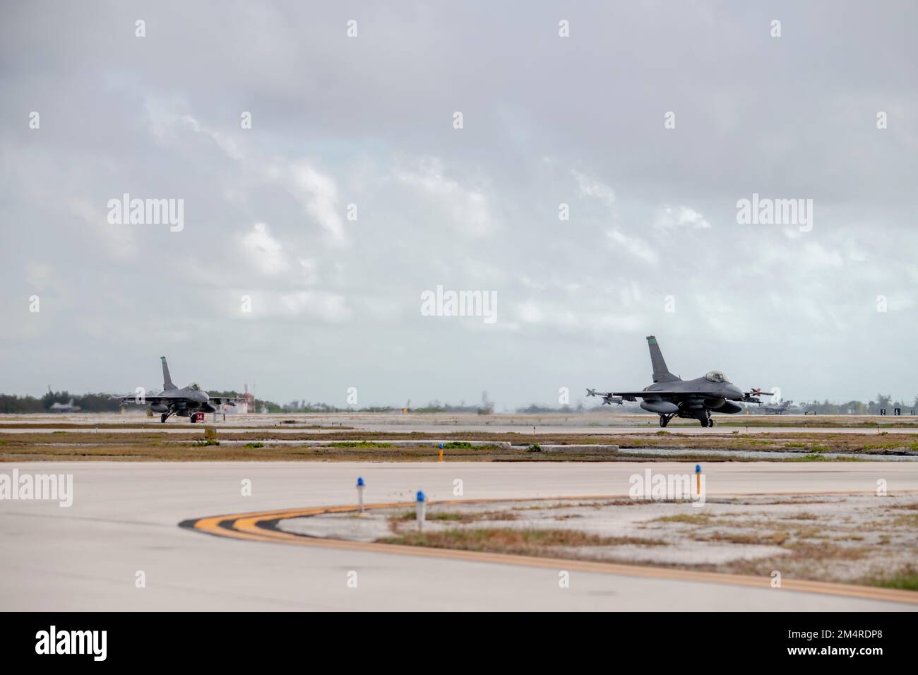 U.S. Air Force F-16 Fighting Falcons, assigned to the Ohio National Guard’s 180th Fighter Wing, taxi to the flightline after a training flight at Naval Air Station Key West, Fla., Nov. 2, 2022. The 180FW deployed to NAS Key West to train with VFC-111, the Navy's premier adversary squadron, providing realistic training scenarios that ensure the 180FW is prepared for homeland defense and contingency operations around the globe.  (U.S. Air National Guard photo by Staff Sgt. Kregg York) Stock Photo