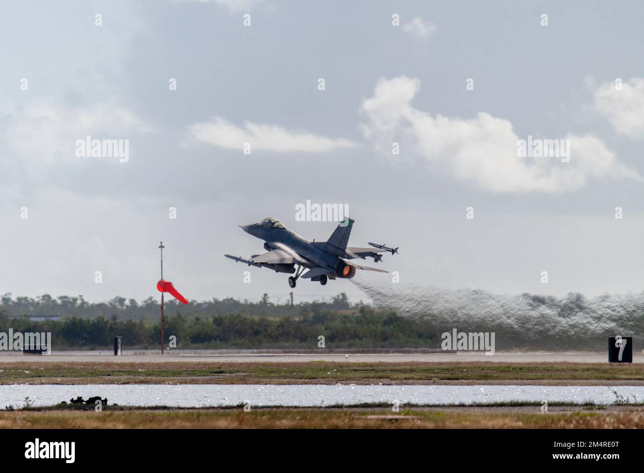 A U.S. Air Force F-16 Fighting Falcon, assigned to the Ohio National Guard’s 180th Fighter Wing, takes off for a training flight at Naval Air Station Key West, Fla., Oct. 31, 2022. The 180FW deployed to NAS Key West to train with VFC-111, the Navy's premier adversary squadron, providing realistic training scenarios that ensure the 180FW is prepared for homeland defense and contingency operations around the globe.  (U.S. Air National Guard photo by Staff Sgt. Kregg York) Stock Photo