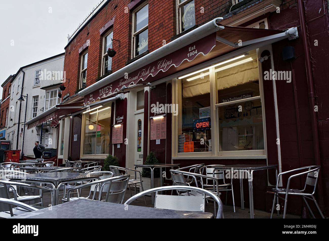 Outside of Tate's, the awardwinning fish & chip shop in the town