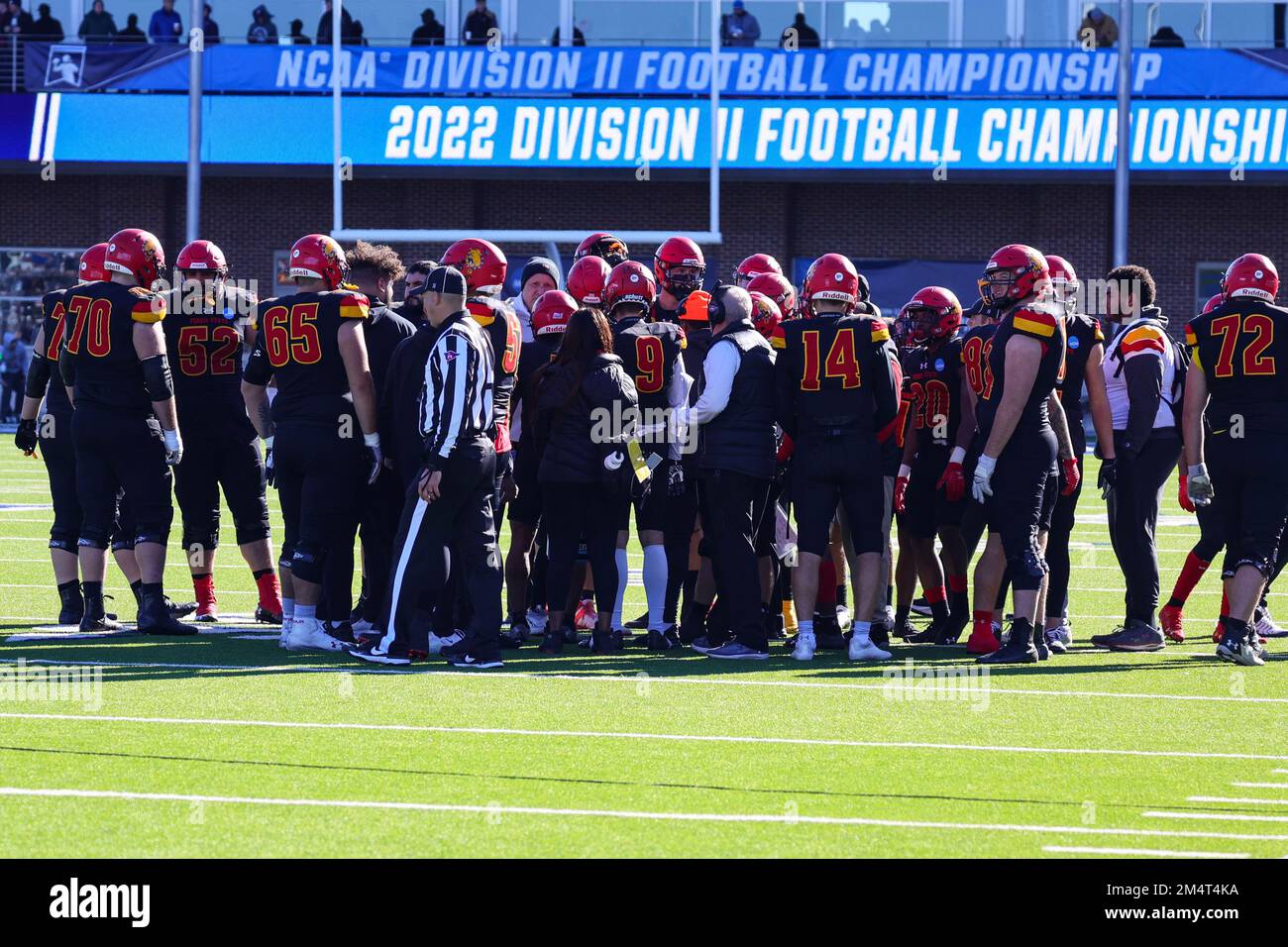 Ferris State Bulldogs huddle during the NCAA Division II national championship college football game, at McKinney ISD Stadium Saturday, Dec. 17, 2022, Stock Photo