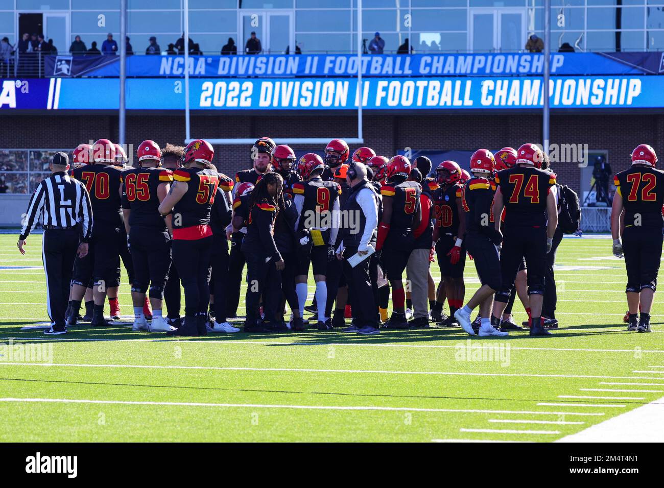 Ferris State Bulldogs huddle during the NCAA Division II national championship college football game, at McKinney ISD Stadium Saturday, Dec. 17, 2022, Stock Photo