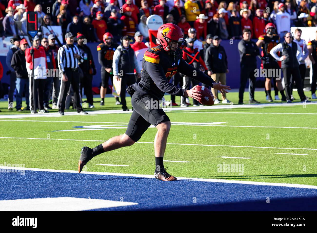 Ferris State Bulldogs punter Quentin Beck (47) punts during the fourth