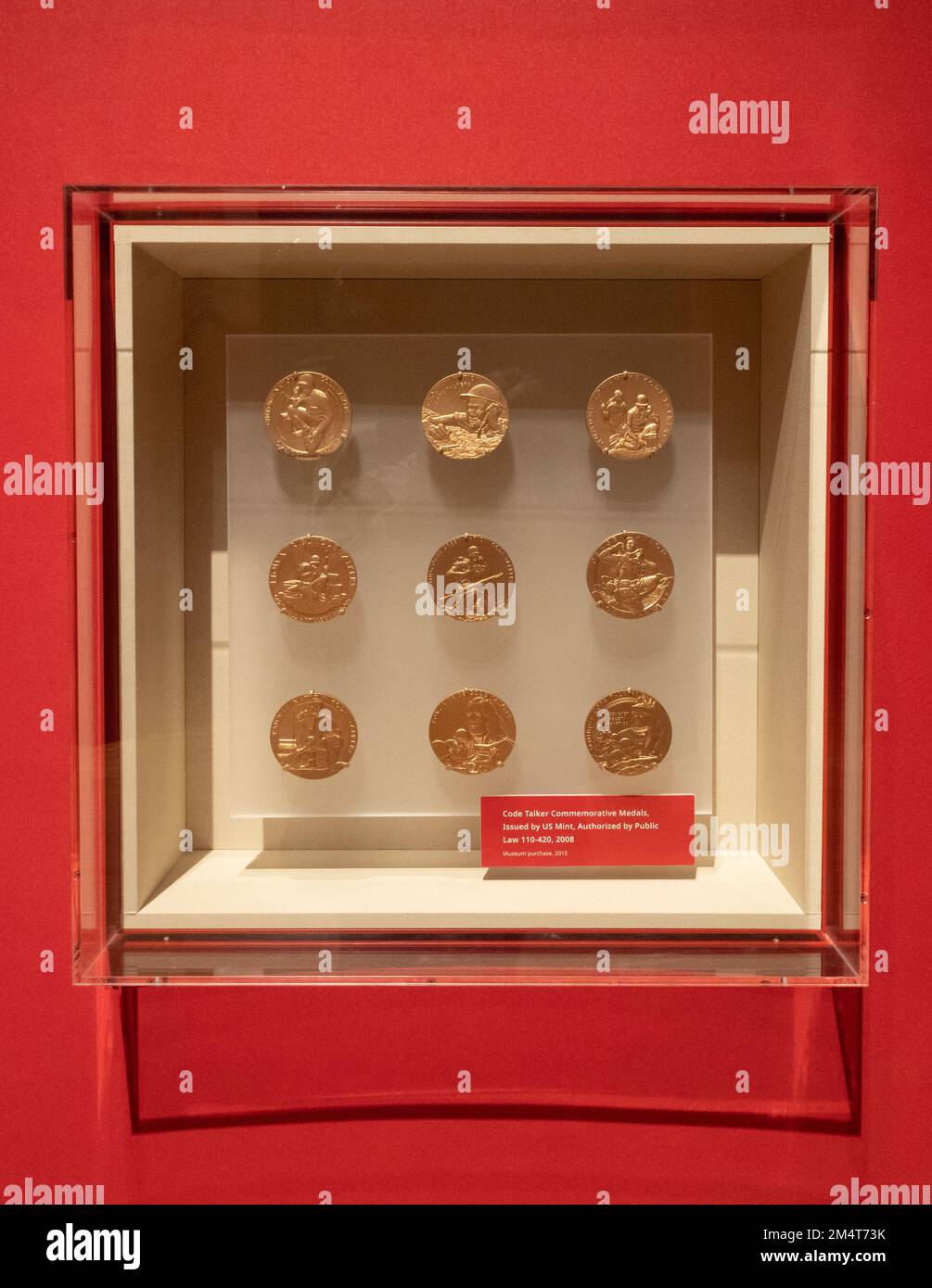 Nine gold Code Talker Commemorative Medals on display at the First Americans Museum in Oklahoma City, Oklahoma. Stock Photo