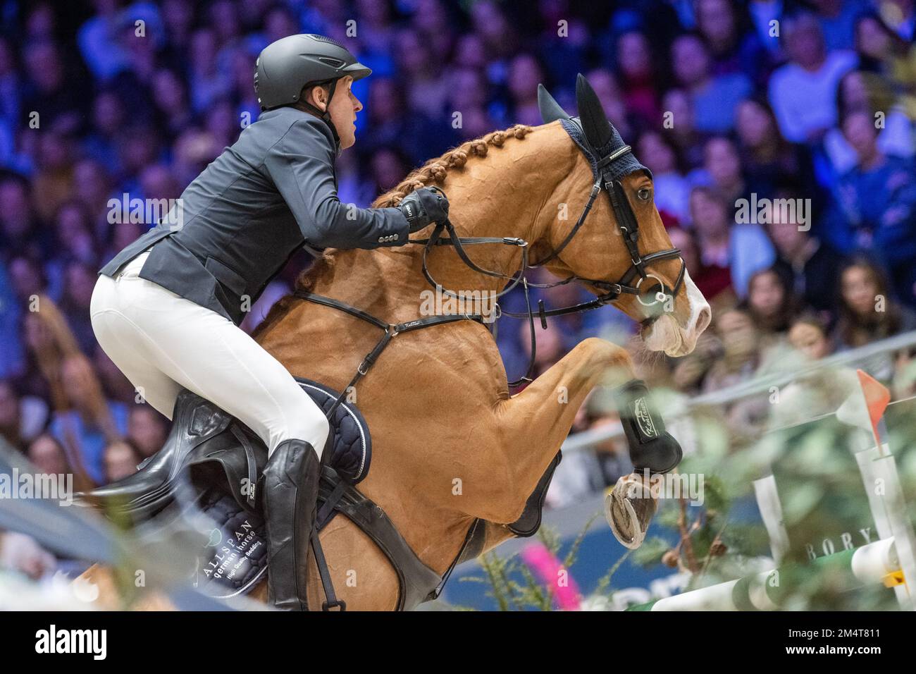 GENEVE, SWITZERLAND - DECEMBER 11 2022 : Andre THIEME of Germany riding DSP Chakaria  at  - CHI de Geneve - Rolex Grand Prix  on December 11, 2022 in Geneve, . Stock Photo