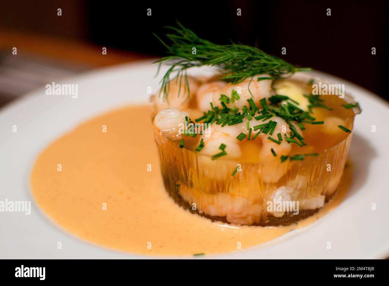 Savoury jelly with shrimp and runny egg Stock Photo Alamy