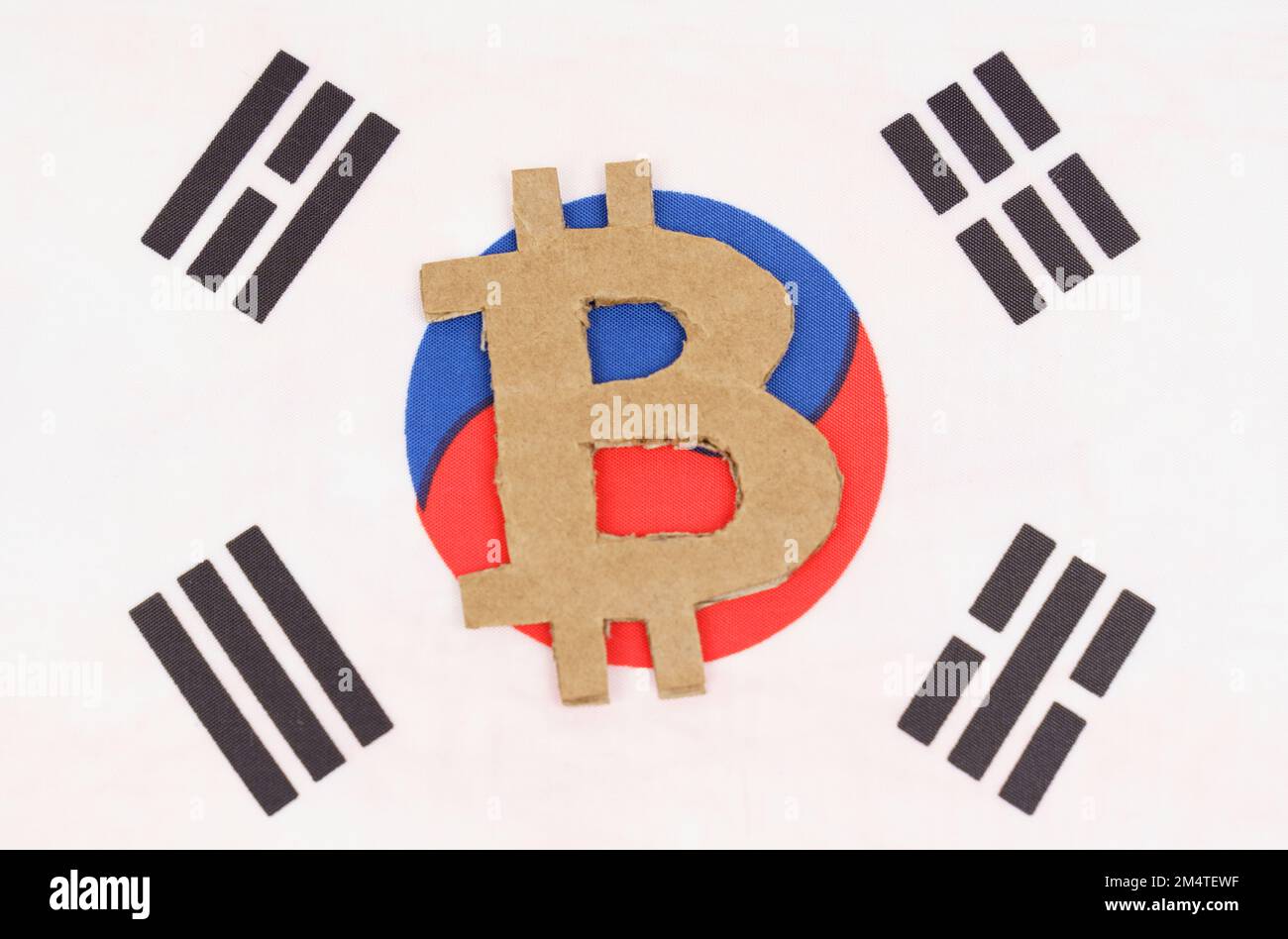 Cryptocurrency concept. On the background of the flag of South Korea lies  the symbol of bitcoin Stock Photo - Alamy