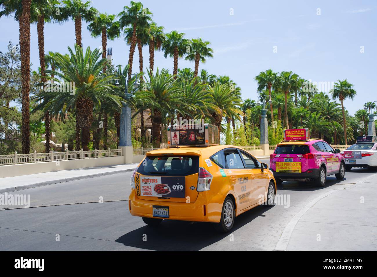 Las Vegas, Nevada, USA- May 5, 2022.  Taxi cabs lined up close to the hotel waiting for customers, Mandalay Bay Hotel and Casino Stock Photo