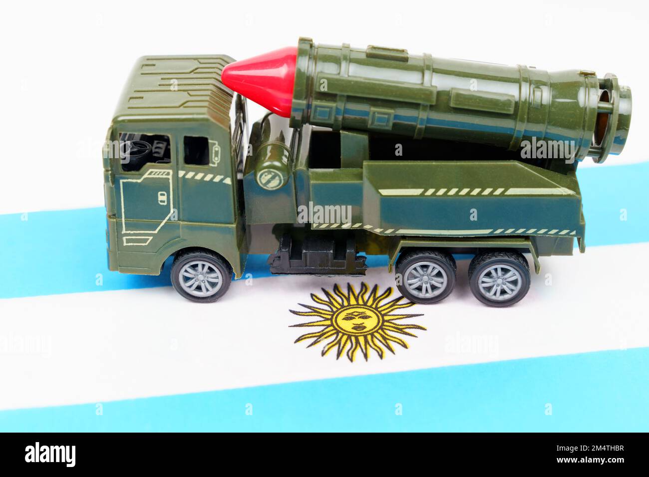 Military concept. The flag of Argentina has a missile system. Symbols of defense and military conflicts. Stock Photo