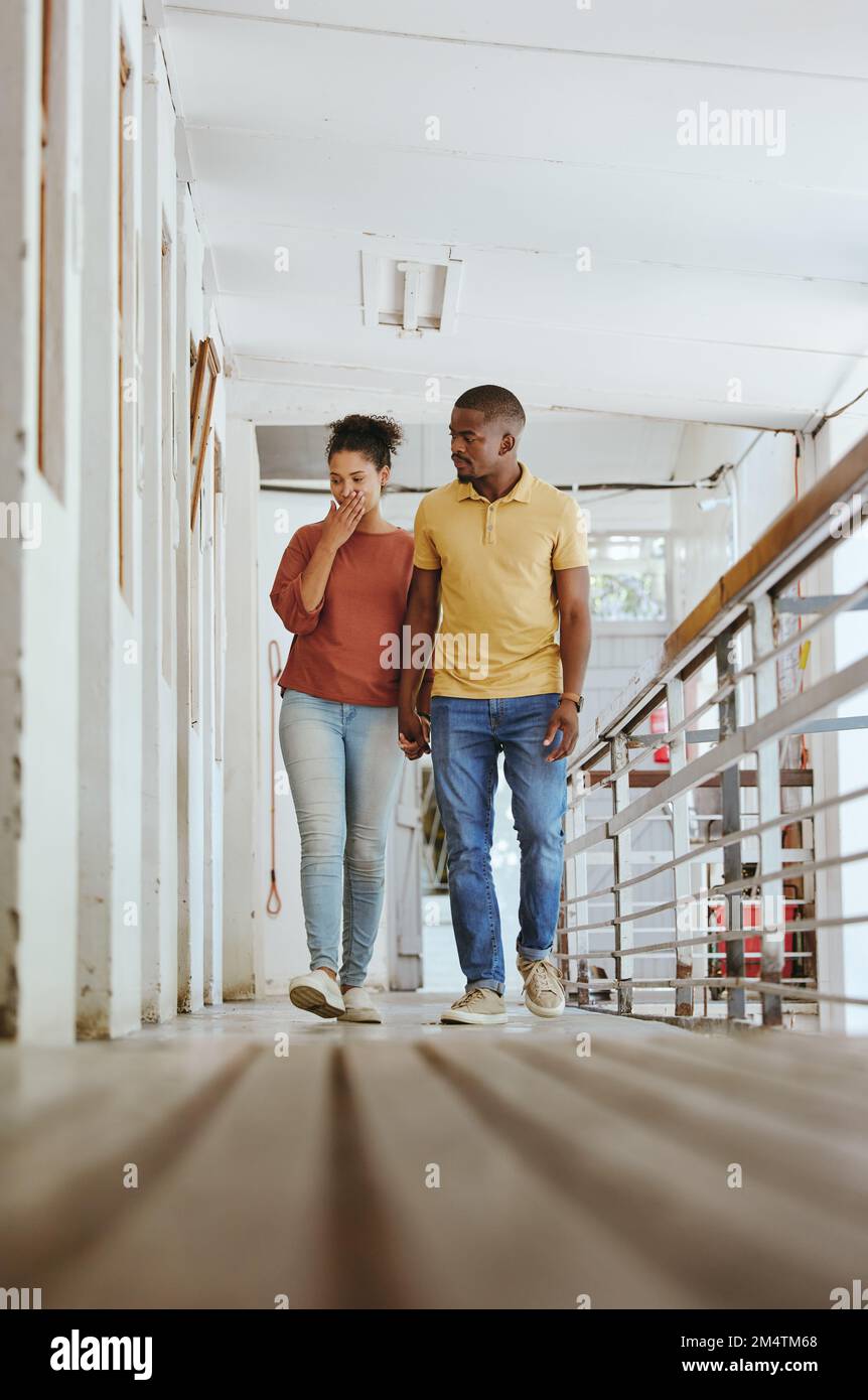 Black couple, home inspection or renovation project in future development, family home or vision. Couple, house flipping or diy for old building Stock Photo