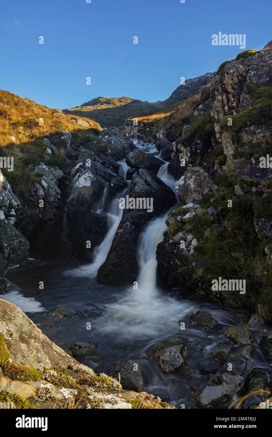The waters of Allt a' Choire Mhoir, in the hills above Loch Long. Stock Photo