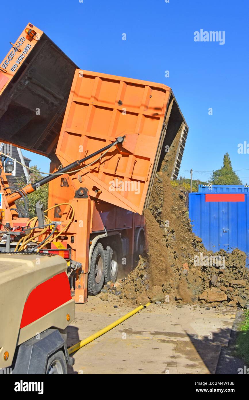 Suction excavator machine on hgv lorry truck creates gas main pits in image 2M4W1F6 and fills with earth spoil which needs tipping out for removal UK Stock Photo