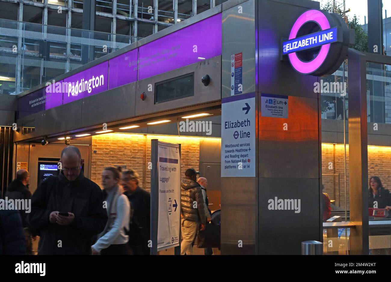 New Elizabeth Line Crossrail entrance to station at London Paddington, purple London transport Elizabeth Line roundel sign Stock Photo