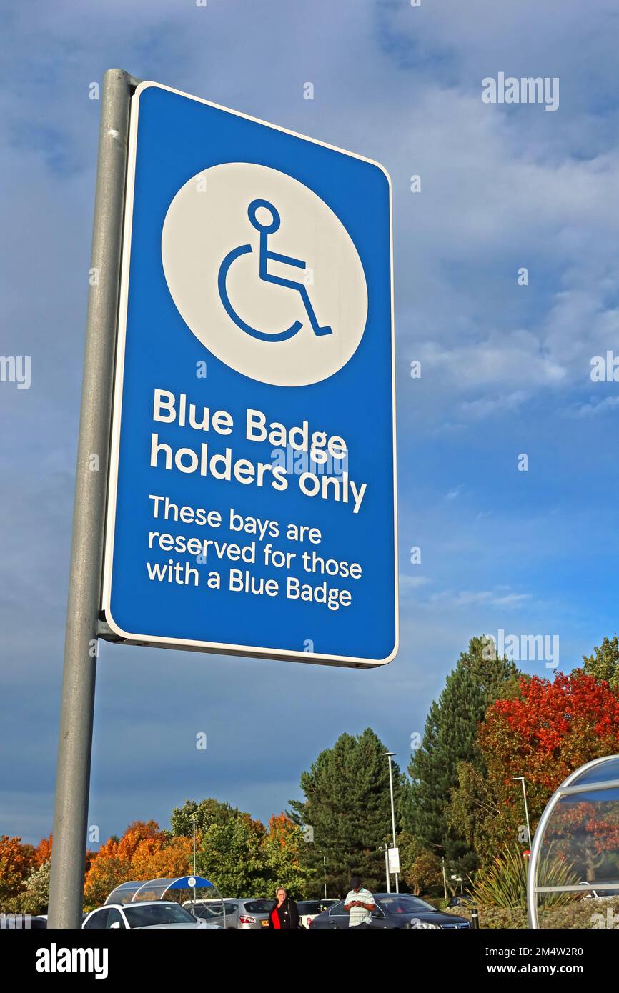 Blue badge holders only area sign, these bays are reserved for those, with a blue badge,Tesco Askham Bar, Tadcaster Rd, York, Yorkshire, YO24 1LW Stock Photo